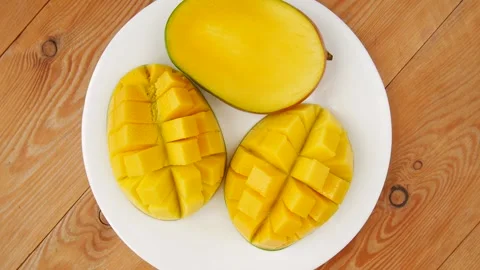 Sliced mango on a plate. Stock Footage 238764674