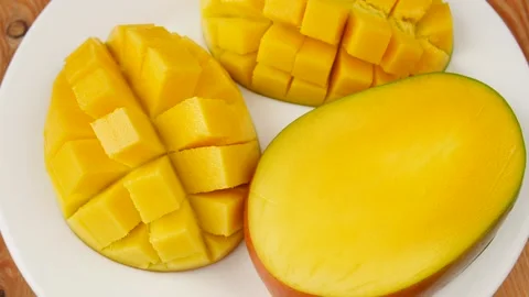 Sliced mango on a plate. Stock Footage 239888050