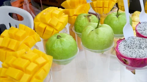 Sliced mangoes guavas. Mango cube slices, mango fruit. Healthy food concept Stock Footage 311601926