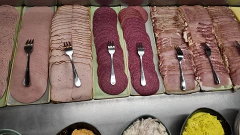 Sliced meat and cold cuts assortment on breakfast buffet Stock Footage 336313096