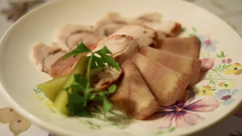 Sliced meat snacks with pickled cucumbers rotate on pate Stock Footage 276368310