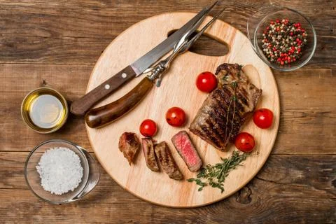 Sliced medium rare grilled Beef steak Ribeye Stock Photos