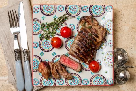 Sliced medium rare grilled Beef steak Ribeye Stock Photos