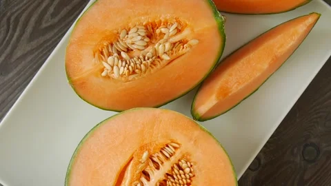 Sliced melon on a plate. Video stock 302053266