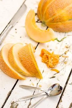 Sliced melon on the table Stock Photos
