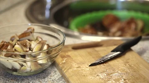 Sliced mushrooms in the kitchen Stock Footage 88997199