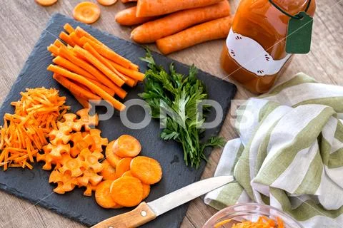 Sliced nutrient organic raw carrot top view . Stock Photos