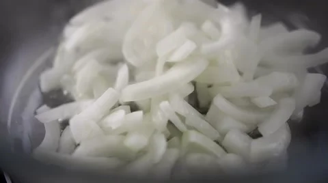 Sliced onion in boiled water Stock Footage 64544243