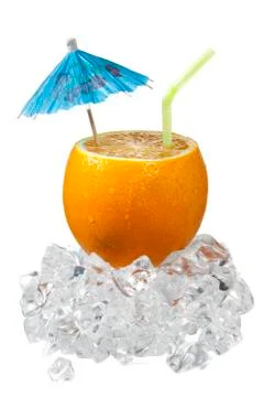 Sliced orange with drinking straw and umbrella Stock Photos