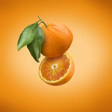 Sliced orange fruit Stock Photos
