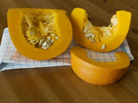 Sliced orange pumpkin Stock Photos