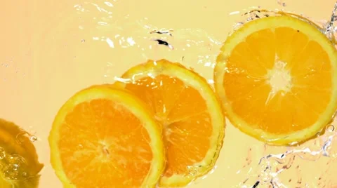 Sliced orange in water, Slow Motion Stock Footage