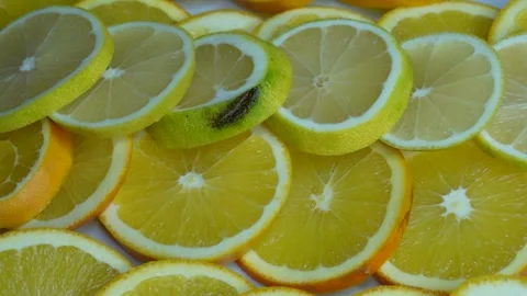 The sliced oranges and lemons are rotated. Stock Footage 255574451