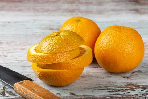 Sliced ??oranges on the table. Stock Photos