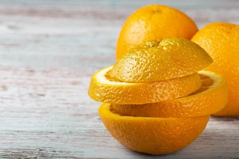 Sliced ??oranges on the table. Stock Photos