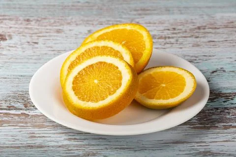 Sliced ??oranges on the table. Stock Photos