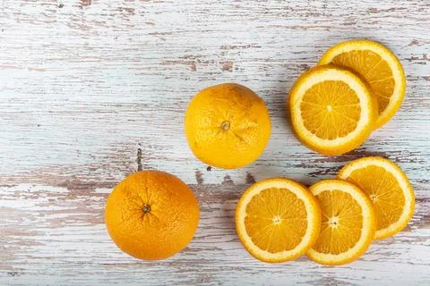 Sliced ??oranges on the table. Stock Photos