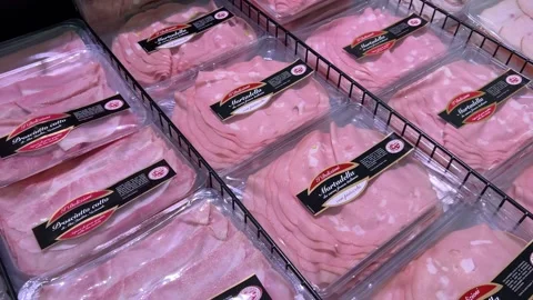 Sliced packages of cured meats displayed Stock Footage 267137578