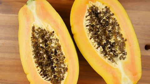 Sliced papaya on the table. Stock Footage 239712569