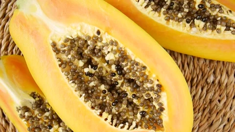 Sliced papaya on the table. Stock Footage 240079346