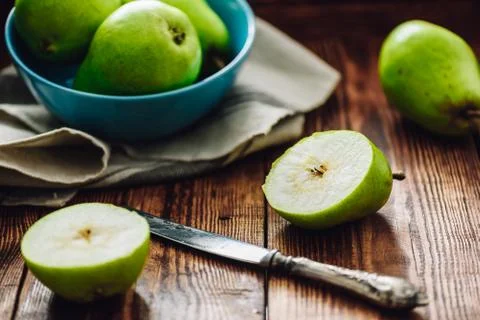 Sliced Pear with Knife. Stock Photos