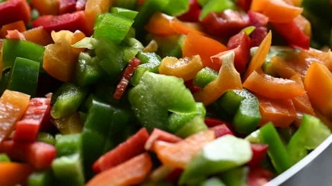Sliced pepper salad. Mixed vegetables food, healthy vegetarian vegan meal. Stock Footage 170700623