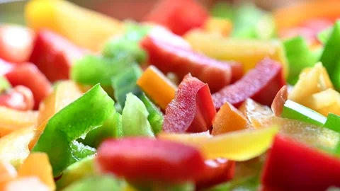Sliced pepper salad. Mixed vegetables food, healthy vegetarian vegan meal. Stock Footage 195002297