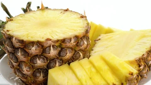 Sliced pieces delicious pineapple fruit. Tropical summer food concept. Rotate Vidéo 152779660