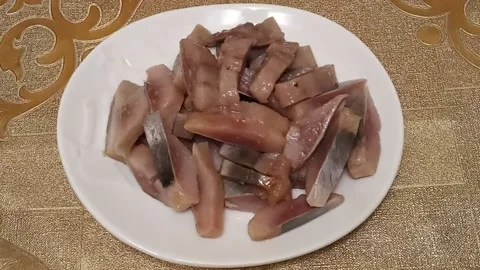 Sliced ​​pieces of herring Stock Footage 227295347