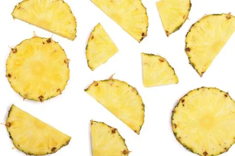 Sliced pineapple isolated on white background. Top view. Flat lay pattern Stock Photos