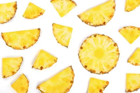 Sliced pineapple isolated on white background. Top view. Flat lay pattern Stock Photos