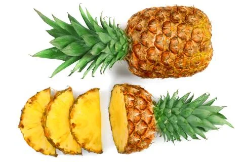 Sliced pineapple isolated on white background. Top view. Flat lay Foto stock