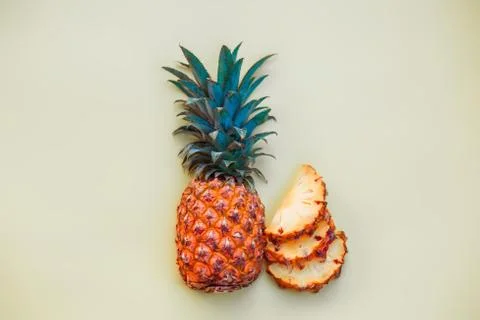 Sliced pineapple on a light colored background Foto stock