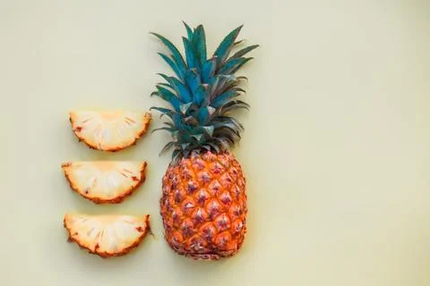 Sliced pineapple on a light colored background Stock Photos