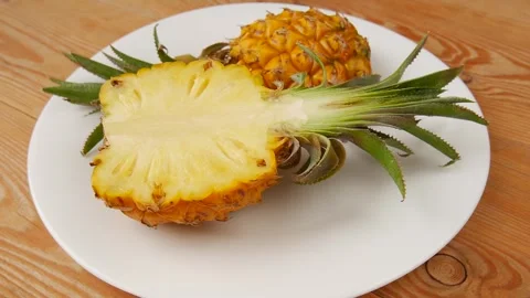 Sliced pineapple on a plate. Stock Footage 240618450