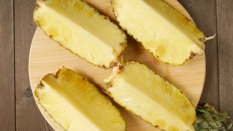 Sliced pineapple on a plate. Stock Footage 301860087