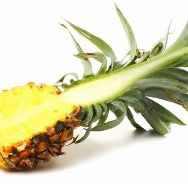 Sliced pineapple on a white background Stock Photos