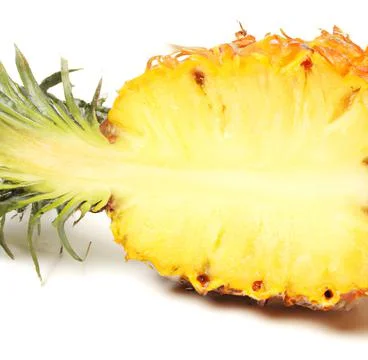 Sliced pineapple on a white background Stock Photos