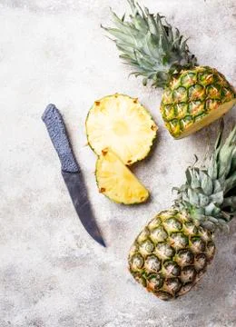 Sliced pineapple on white table Stock Photos