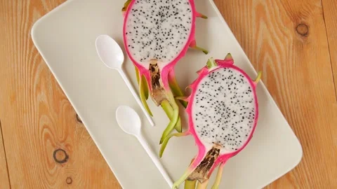 Sliced pitahaya on a plate. Stock Footage 241909745