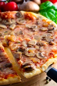 Sliced pizza Stock Photos