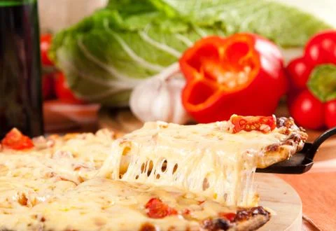Sliced pizza Stock Photos