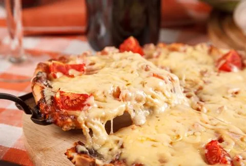 Sliced pizza Stock Photos