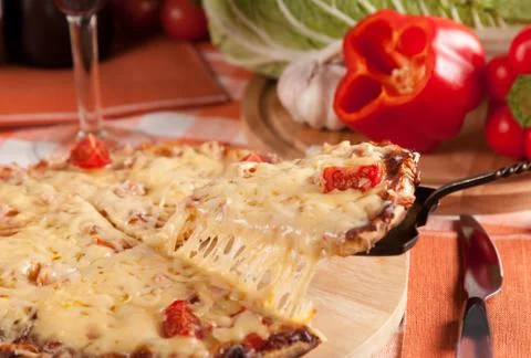 Sliced pizza Stock Photos