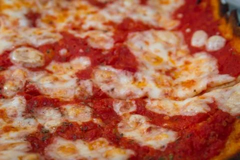 Sliced pizza Stock Photos