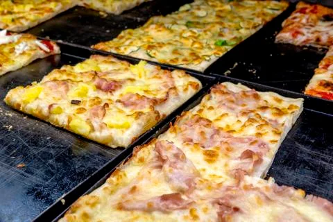 Sliced pizza Stock Photos