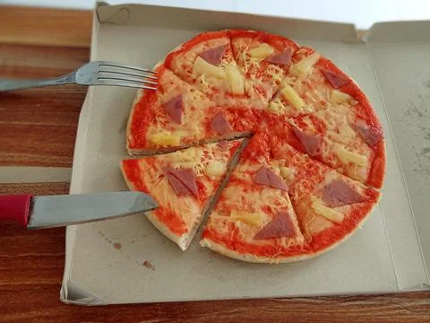 Sliced pizza on the table Foto stock