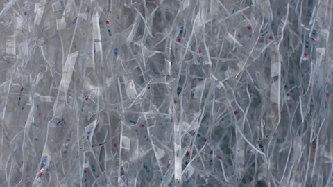 Sliced plastic on ribbons for recycling in plant Video stock 88371553