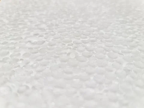 Sliced polystyrene foam white texture, shallow depth of field Stock Photos