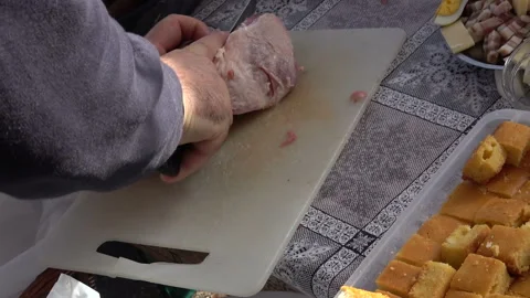 Sliced pork on cutting board for cooking, cutting pork with knife Stock Footage 141074635